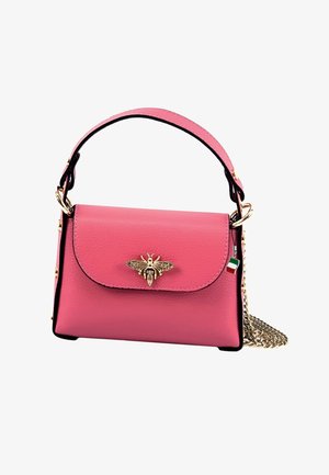 Pink leather handbag with a gold bee emblem, a flap closure, and a detachable chain strap. Features a contrasting dark edge and charm accent.