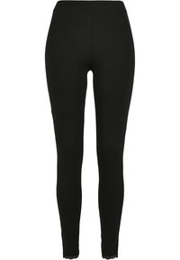 Zwarte leggings van rekbare stof, met een hoge tailleband en kantafwerking bij de enkel voor extra detail. Glad textuur en aansluitend ontwerp.