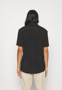 YOURTURN Camicia - black