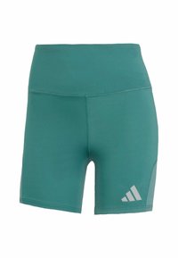 Tūsku zaļi sporta šorti ar gludu, elastīgu audumu. Augsta jostasvieta un atstarojošs balts adidas logo apakšējā labajā pusē.