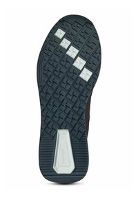 De zool van de schoen heeft een gestructureerde donkere rubberen basis met een wit accentgebied, dat een patroon van vierkanten en rechthoeken vertoont voor grip.