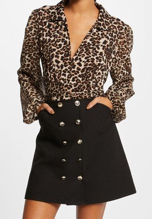 Pusero - mottled dark brown