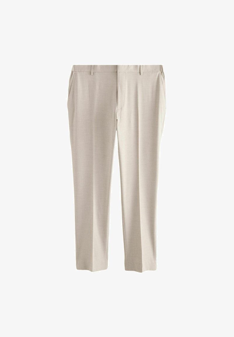 Pantalon formel beige sur mesure avec passants de ceinture, poches latérales et fermeture éclair à l'avant.