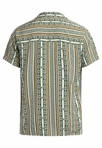 Short-sleeve shirt featuring a green and white patterned design with geometric shapes and stripes in brown and yellow accents.
