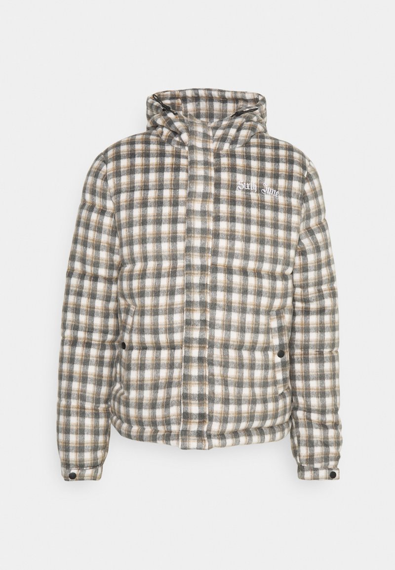 Vadderad rutjacka i grått, vitt och brunt; har en dragskoek. huva, dragkedjestängning och broderad logotyp på vänster bröst.