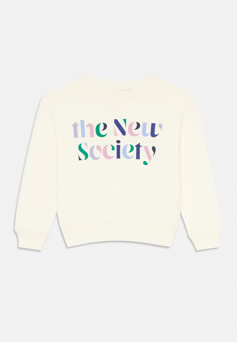 Sudadera crema con cuello redondo y mangas largas que presenta texto multicolor que dice "la Nueva Sociedad" en varias tipografías.