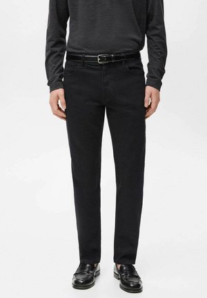 - Spodnie materiałowe