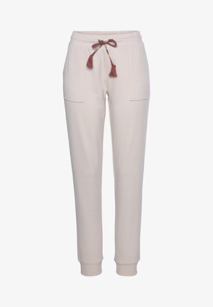 Light beige sweatpants with an elastic waistband, drawstring with colorful tassels, side pockets, and ribbed cuffs at the ankles.