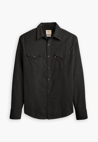 Czarna koszula z długim rękawem, zapinana na guziki, z ostrym kołnierzykiem, dwiema kieszeniami na piersi oraz subtelnie fakturowanym materiałem. Posiada logo Levi's na kieszeni.