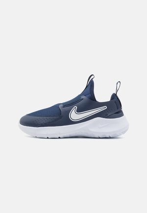 Sneakers slip-on blu navy con tomaia in mesh traspirante, logo Nike bianco a contrasto e suola in gomma testurizzata.