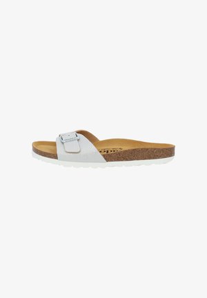 White glittery slide sandal with a cork footbed and textured rubber sole. Features a silver metal buckle accent on the strap.