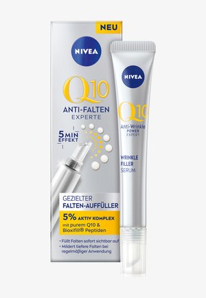 NIVEA Q10 Anti-Falten-Serum in einer silbernen Tube mit einer klaren Applikatorspitze. Die Verpackung zeigt gelbe und blaue Schrift auf grauem Hintergrund.