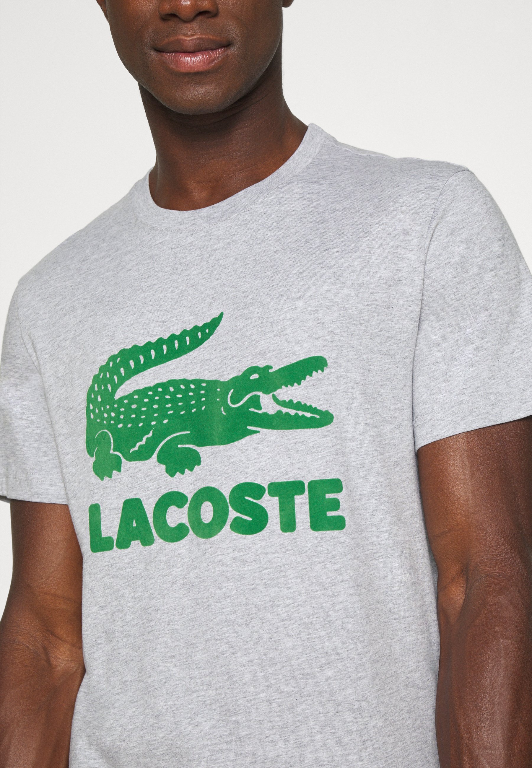 lacoste silver crocodile