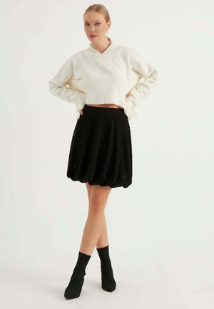 Puffball skirt - mottled black