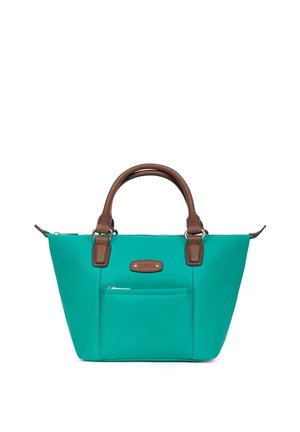 Sac à main bleu sarcelle avec poignées en cuir marron, poche avant zippée et petite étiquette logo marron, sur fond blanc.