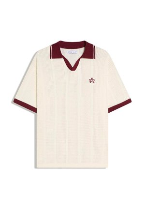 Koszulka polo z krótkim rękawem o kremowej fakturze, z bordowym kołnierzykiem, lamówkami na rękawach oraz małym haftowanym logo "LA" na lewej piersi.