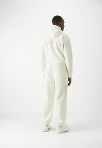 Nike Performance JORDAN X PARIS ST GERMAIN PANT - Klub merchandise - sail/sanddrift
