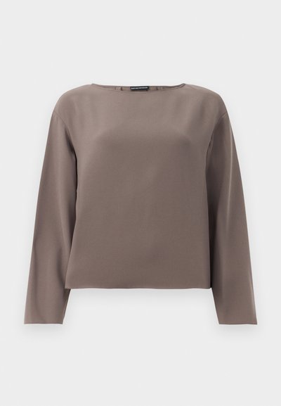 Brown long-sleeve top with a wide neckline, made from a smooth, soft fabric. Features a relaxed fit and minimal design without embellishments.