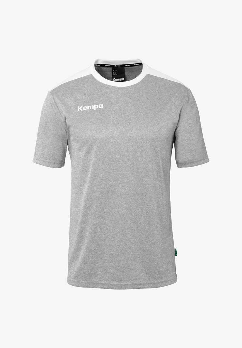 Grijze T-shirt met korte mouwen en witte accenten op de schouders. Bevat het "Kempa" logo op de voorkant en heeft een zachte stofstructuur.