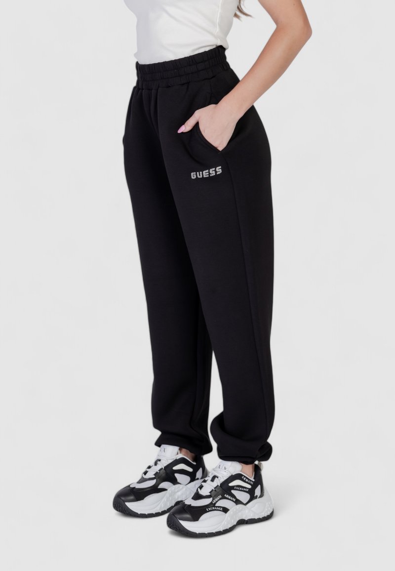 GUESS® Jogger con bande logate Donna