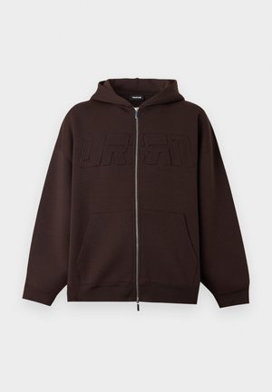 Dark brown zip-up hoodie with front pockets, a hood, and embossed "URBAN" lettering across the chest on a plain background.