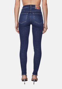 Diesel Jeans Skinny Fit - blue-black denim