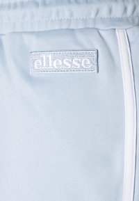 Ellesse Teplákové kalhoty - light blue