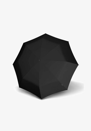 Parapluie noir ouvert vu de dessus avec huit panneaux sur fond blanc.