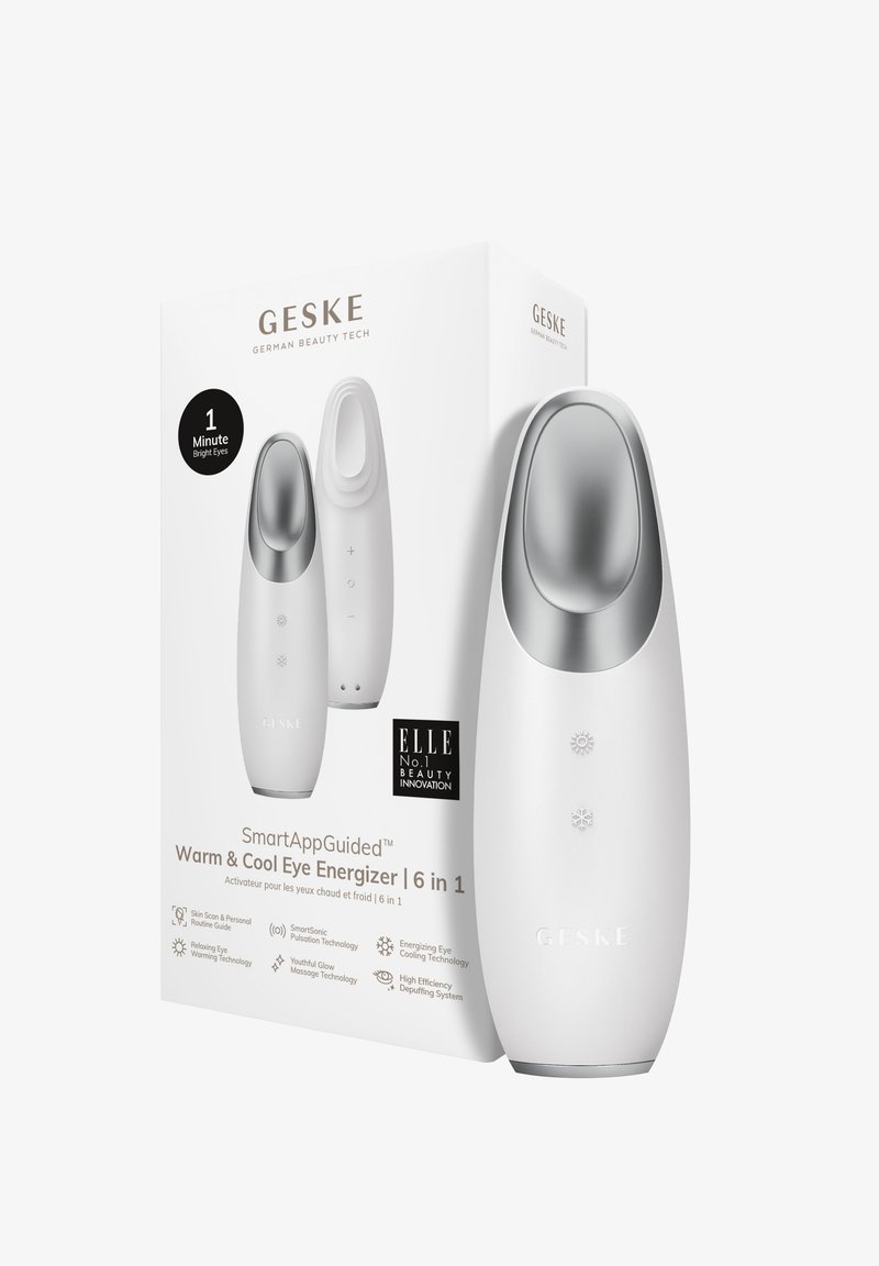 Wit handapparaat met zilveren accenten, voorzien van een afgeronde vorm, gebruiksinterface knoppen en een verpakkingsdoos met productdetails.