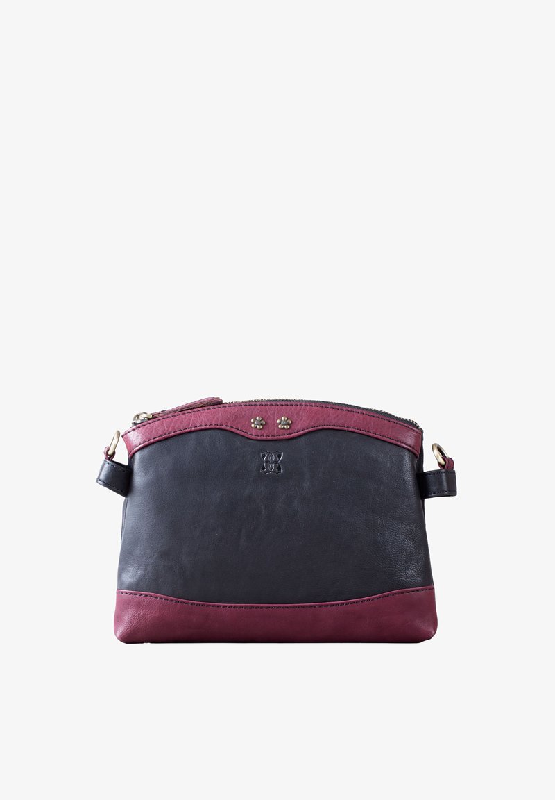 Leather handbag featuring a black body with a burgundy upper section, zip closure, decorative studs, and a detachable strap.