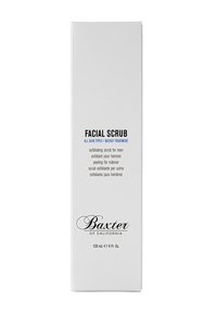Confezione tubolare rettangolare bianca etichettata "Scrub Viso" con testo blu e nero; contiene 120 mL di scrub esfoliante per tutti i tipi di pelle.