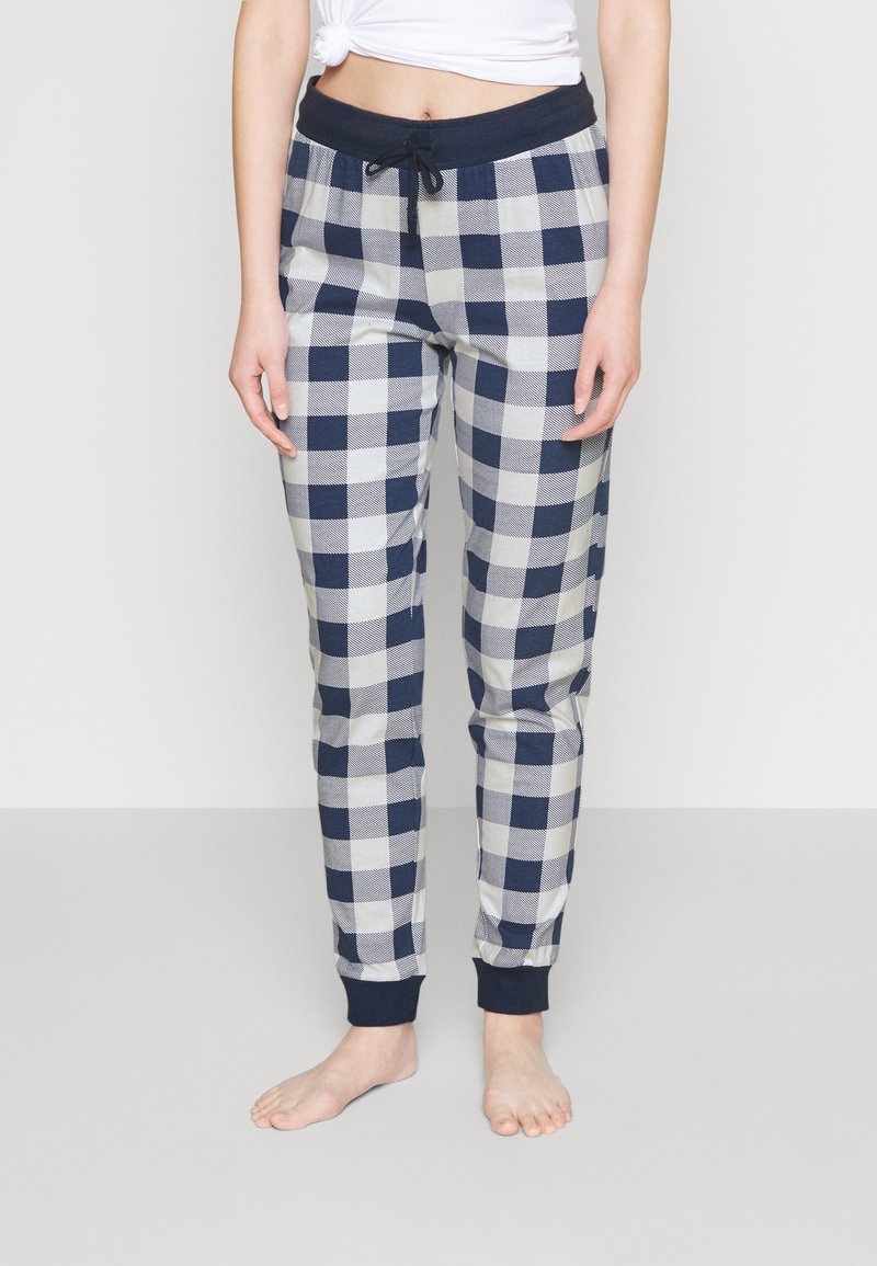 Calças de pijama em padrão xadrez azul e branco, com um cós elástico, cordão na cintura e punhos ajustados nos tornozelos. Tecido suave e leve.