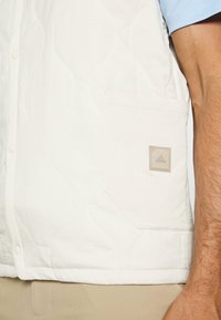 adidas Golf Vesta - beige