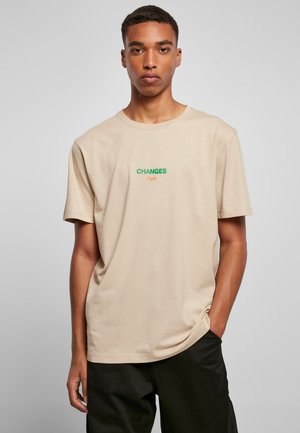 T-shirts med print - sand