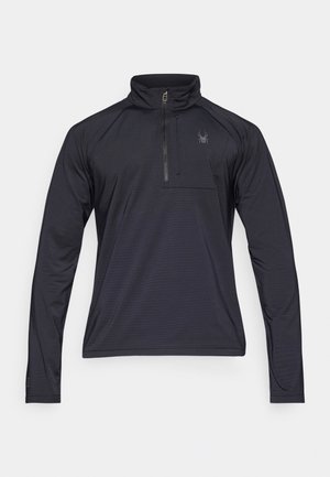 Pullover preto de manga longa e fecho de zip de um quarto, feito de um tecido leve e texturizado. Apresenta um pequeno bolso no peito e um logótipo bordado.