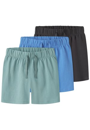 Tri páry elastických šortiek s nastaviteľným pásom so šnúrkami v zelenej, modrej a čiernej farbe, vrstvené na bielom pozadí.