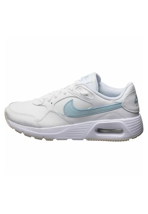 Zapatilla deportiva blanca con el logo Nike en azul claro, collarín acolchado, cierre con cordones y cojín de aire visible en la suela.