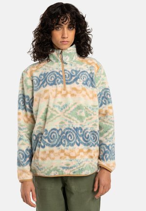 Fleece pullover with a zip collar, featuring a multi-color swirl and geometric pattern in blue, green, and orange on a light background.