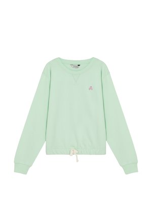 Sudadera de manga larga verde claro con cuello redondo, emblema de calavera rosa en el pecho y cordón blanco en el dobladillo.