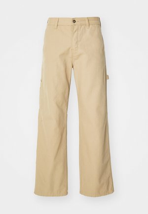 Beige wide-leg cargo pants with a button closure, featuring side pockets, made of sturdy cotton fabric, smooth texture, and straight-cut design.