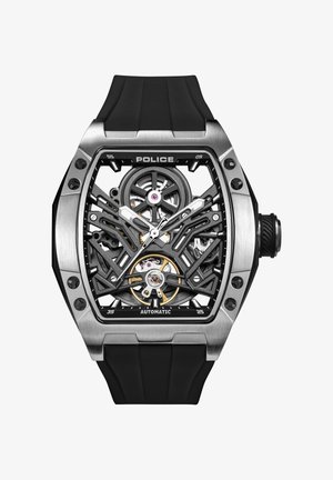 Automatische Uhr mit schwarzem Kautschukarmband, Edelstahlgehäuse, Skelettdesign, schwarzen und goldenen Akzenten und sichtbarem, filigranem Uhrwerk.