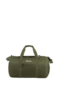 Olijfgroene duffelbag met twee handvatten en een verstelbare schouderband. Voorzien van een voorzak met rits en textuuraccenten.