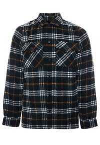 Chaqueta de cuadros en negro, blanco y marrón con dos bolsillos de solapa en el pecho y mangas largas.