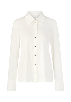 Long-sleeve white button-up shirt with pointed collar and silver buttons down the center front.