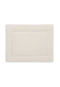 Tapis rectangulaire beige avec une surface douce et texturée. Dispose d'une bordure légèrement surélevée et d'un centre lisse, adapté à divers environnements.