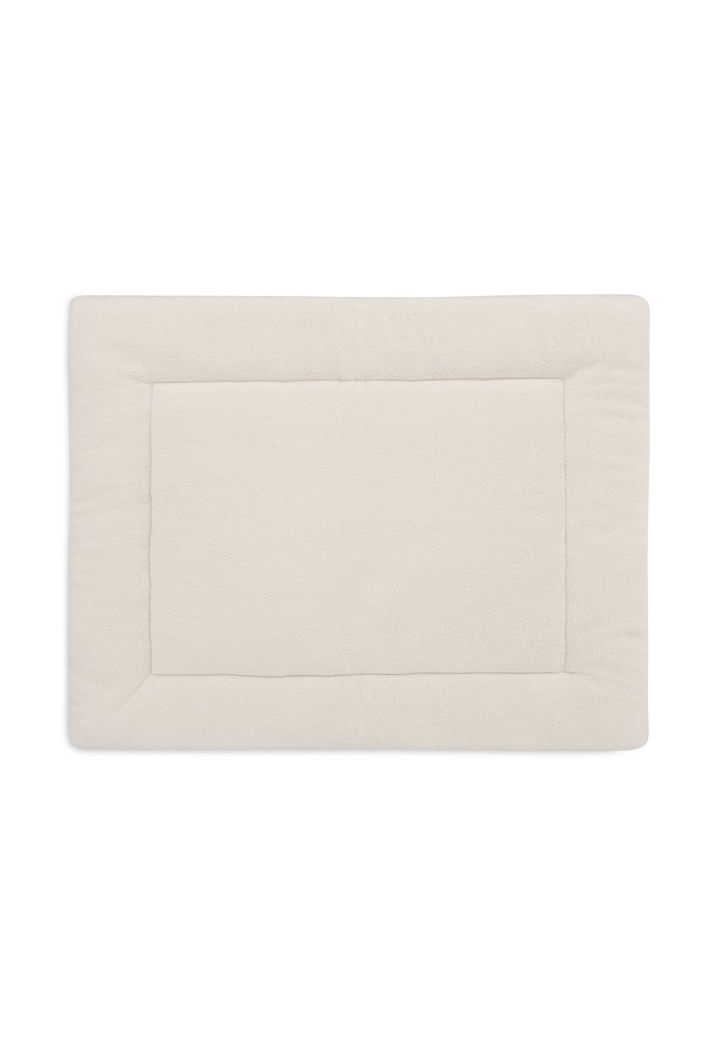 Tapis rectangulaire beige avec une surface douce et texturée. Dispose d'une bordure légèrement surélevée et d'un centre lisse, adapté à divers environnements.