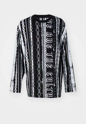 Langærmet skjorte med sort-hvid grafisk design med kæder og tekstmønstre, lavet af letvægtsstof med rund halsudskæring.