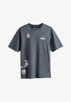 Dark gray cotton t-shirt featuring festive prints: a Christmas ornament, candy cane, star, and gift box. Short sleeves and round neckline.