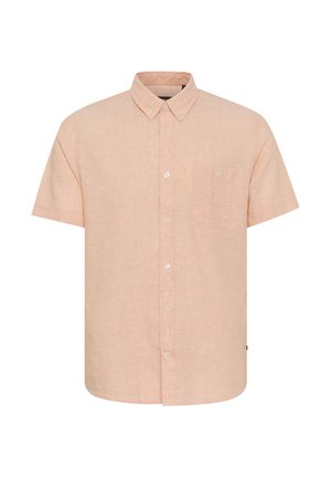 Kortärmad, knappad skjorta i ljusrosa linne med en bröstficka och naturliga knappar. Slät textur med en avslappnad passform.