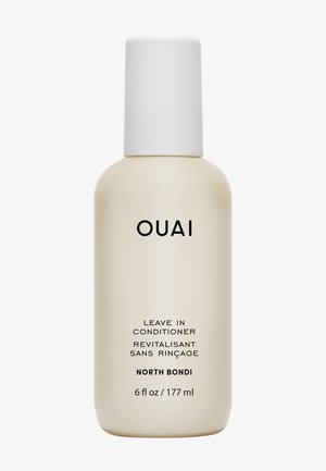 Petite bouteille beige de soin sans rinçage OUAI North Bondi avec bouchon blanc, contenant 177 millilitres ou 6 onces liquides.
